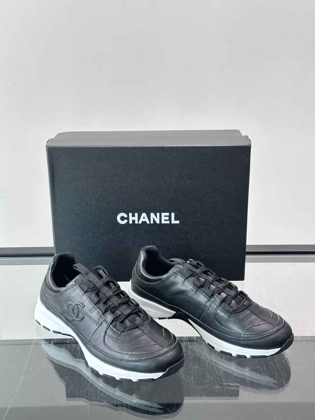 Chanel Black Leather Sneakers