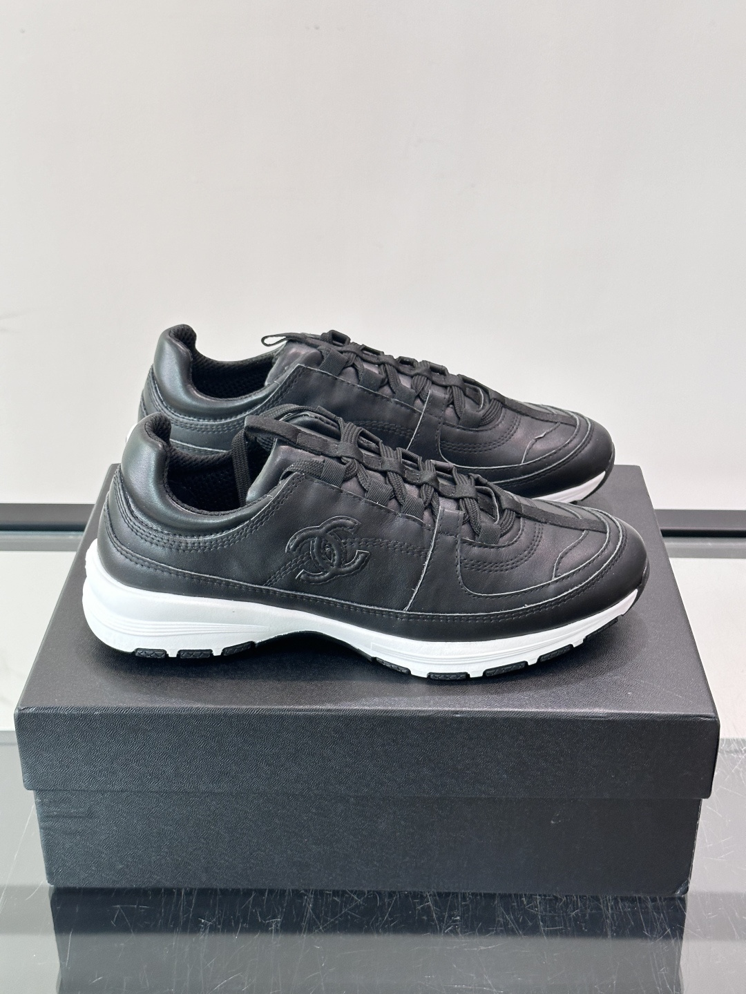 Chanel Black Leather Sneakers