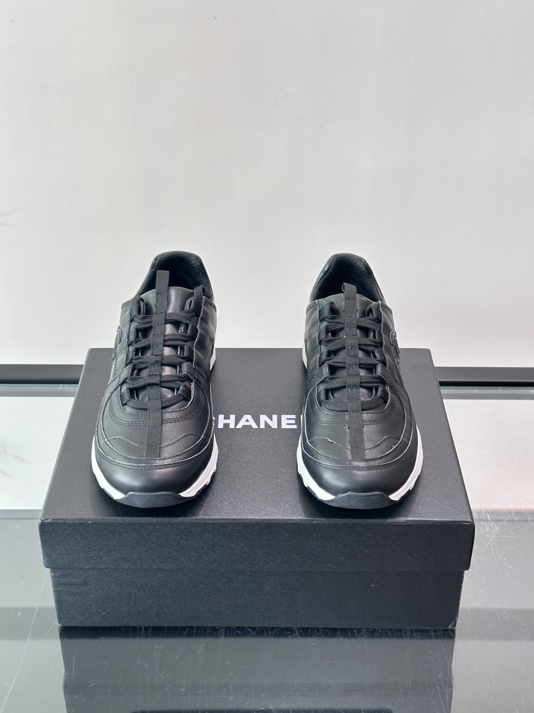 Chanel Black Leather Sneakers