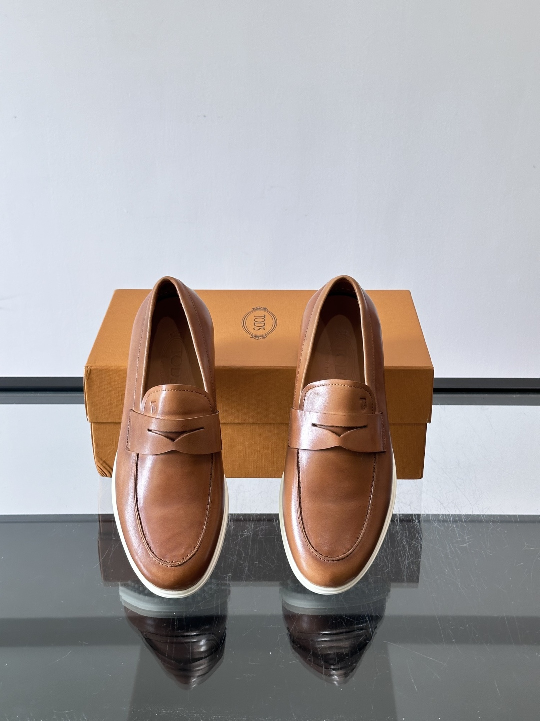 Tod's Brown Calfskin Penny Loafers with White Sole