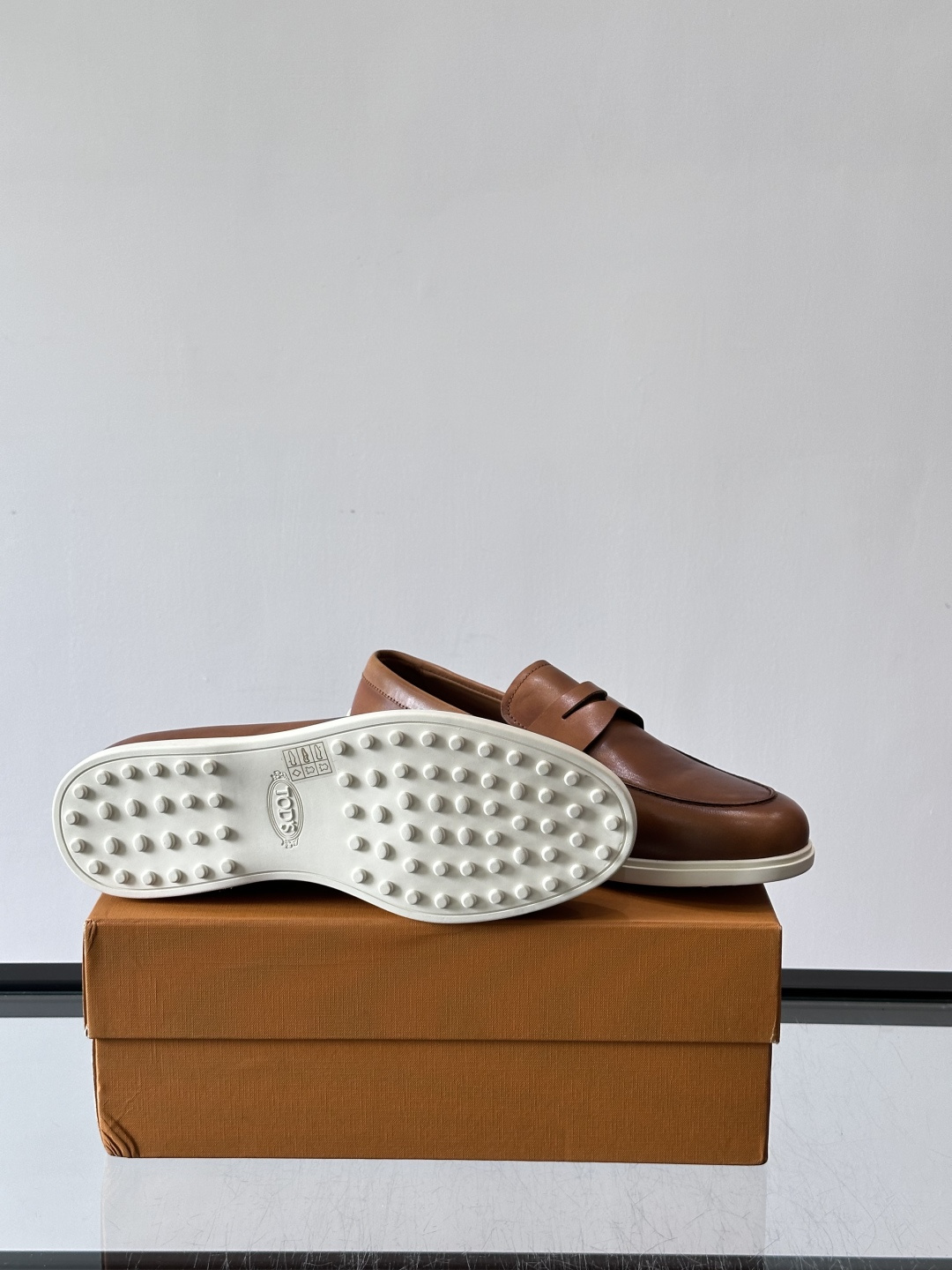 Tod's Brown Calfskin Penny Loafers with White Sole