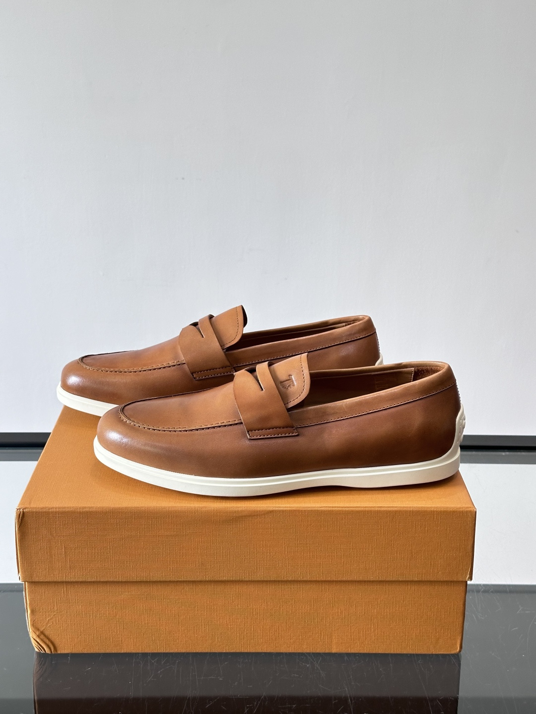 Tod's Brown Calfskin Penny Loafers with White Sole
