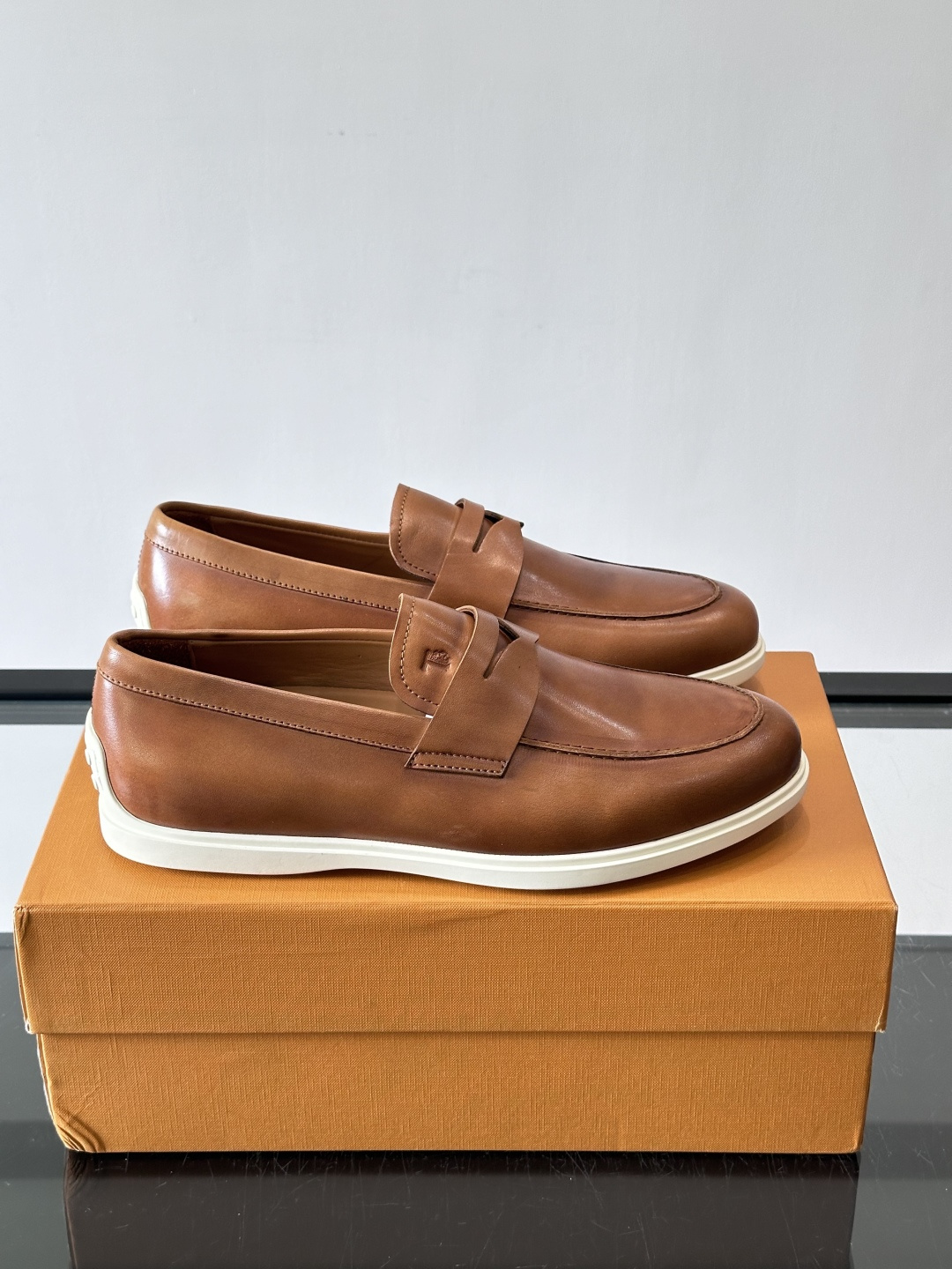 Tod's Brown Calfskin Penny Loafers with White Sole