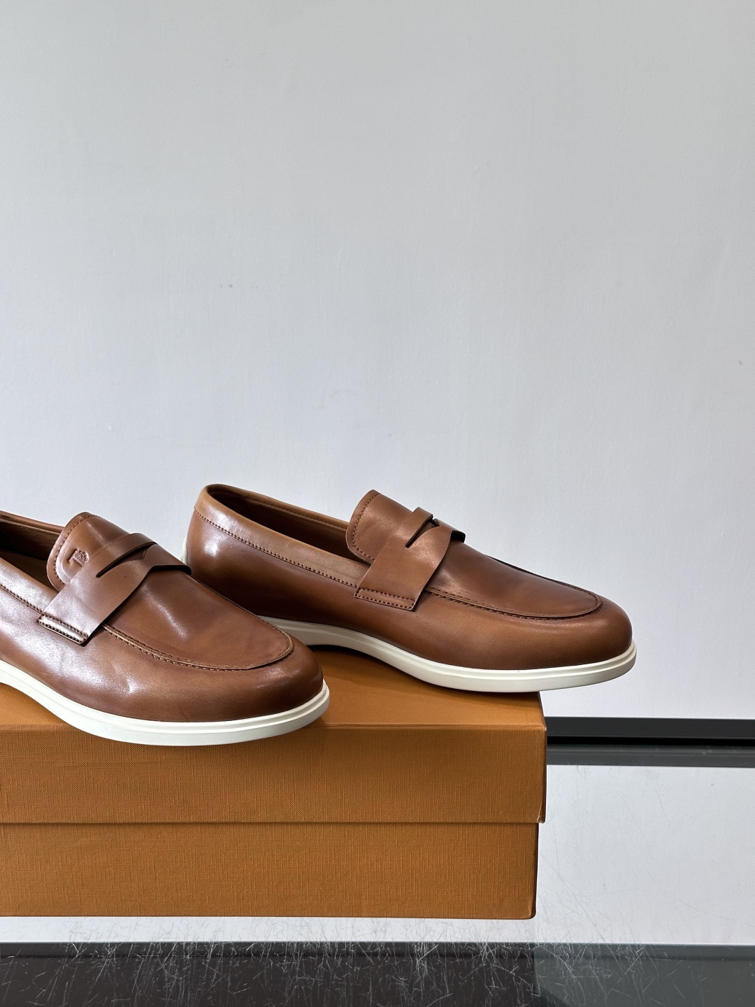 Tod's Brown Calfskin Penny Loafers with White Sole