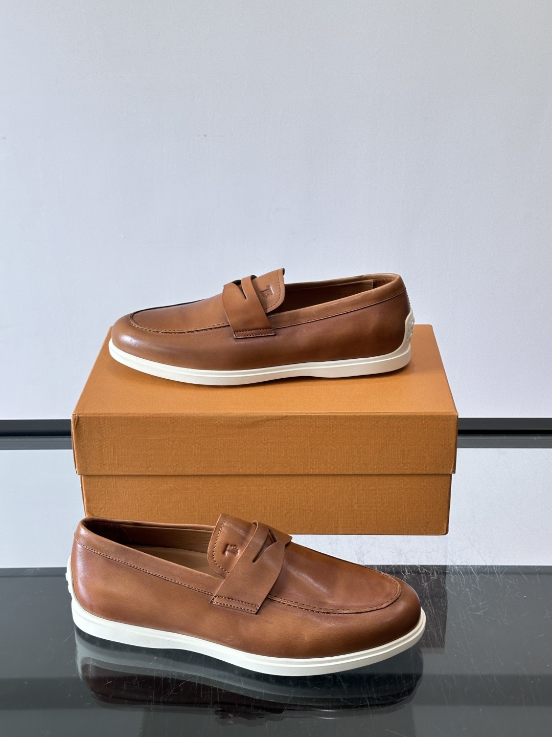 Tod's Brown Calfskin Penny Loafers with White Sole