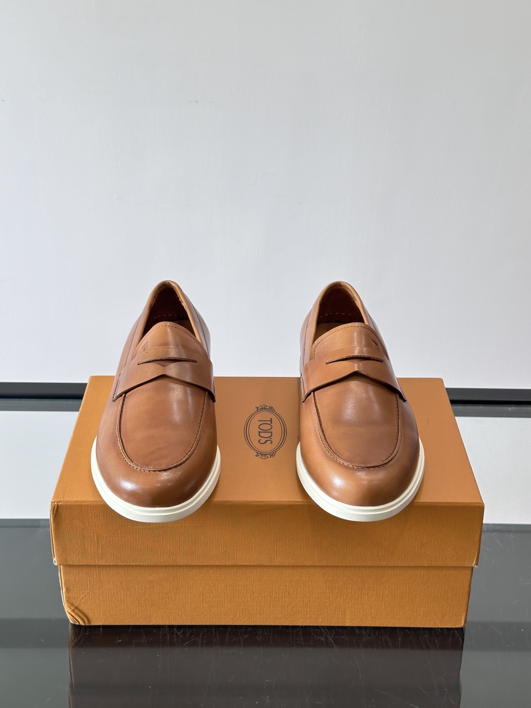Tod's Brown Calfskin Penny Loafers with White Sole