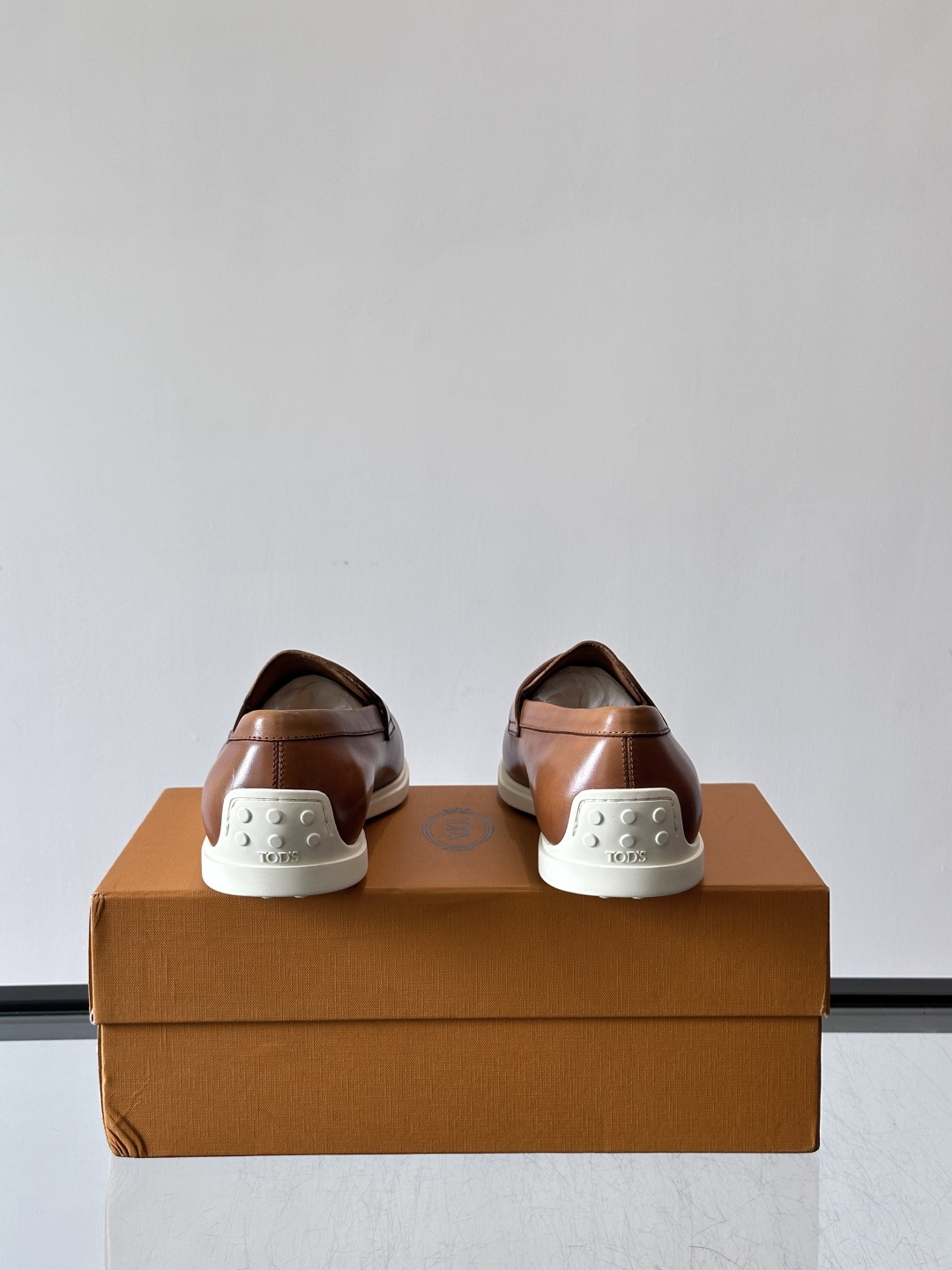 Tod's Brown Calfskin Penny Loafers with White Sole