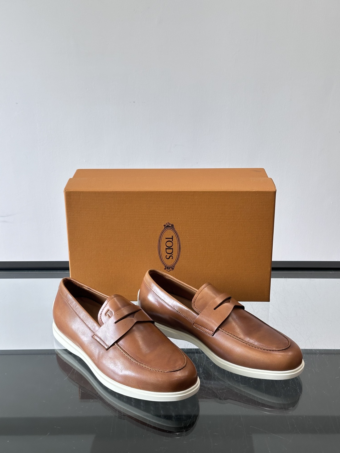 Tod's Brown Calfskin Penny Loafers with White Sole