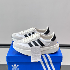 Adidas SL72 运动鞋,麂皮+尼龙鞋面,白色三条纹,,厚底侧面有"LIGHTSTRIKE+"字样。这款走 Adidas SL72 运动鞋,麂皮+尼龙鞋面,白色三条纹,,厚底侧面有"LIGHTSTRIKE+"字样。这款走