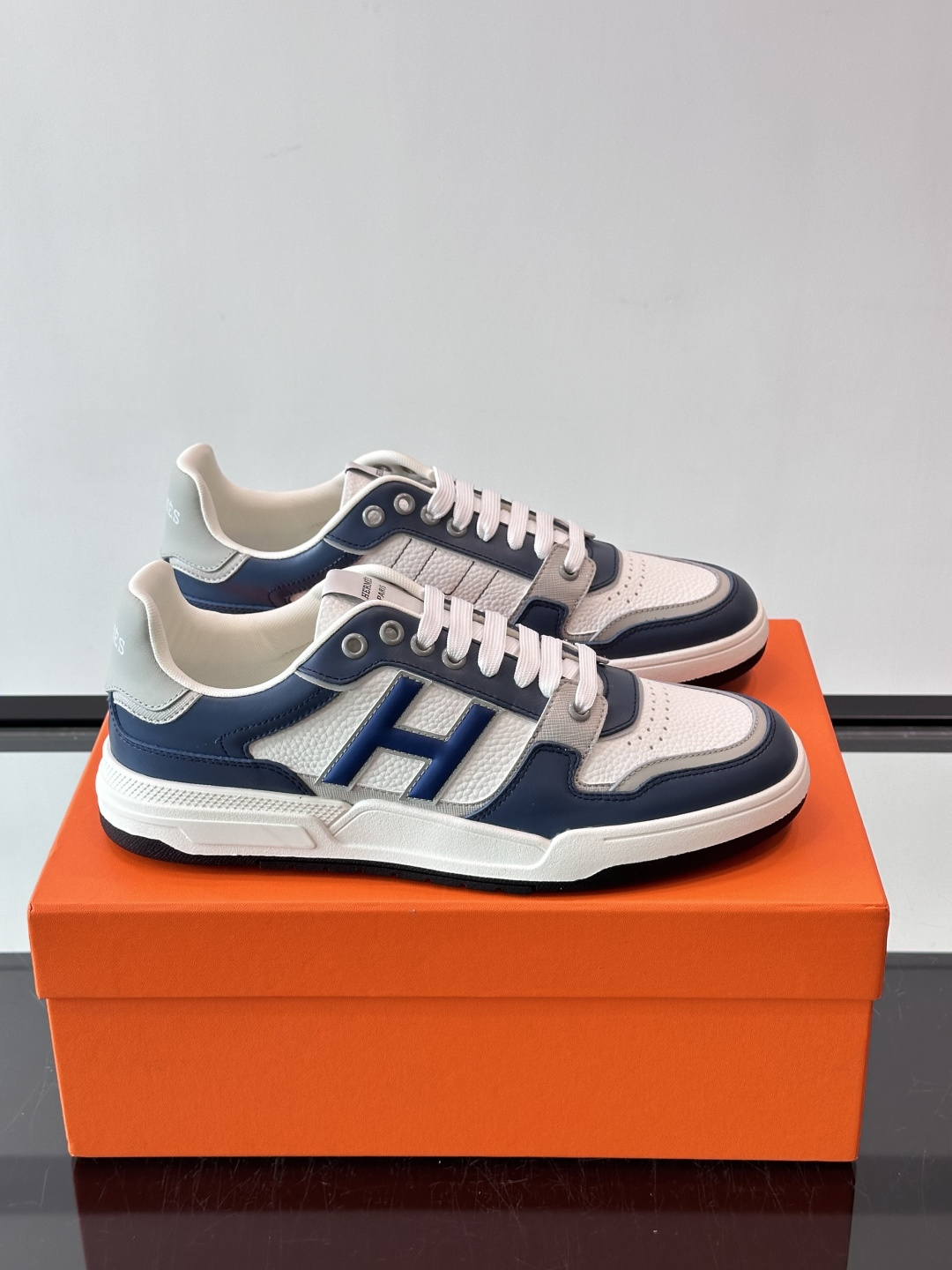 Hermes Blue Logo Low Top Sneakers