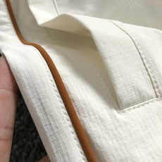 Prad*套装版型 m-xxl2026春夏短袖,以贴布三角标防晒套装为主调,巧妙融入纯色百搭面料元素,打 Prad*套装版型 m-xxl2026春夏短袖,以贴布三角标防晒套装为主调,巧妙融入纯色百搭面料元素,打