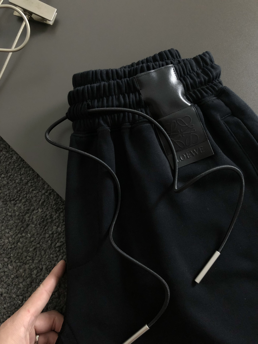 Low*合身版型M-xxl2026春夏短裤，以经典皮标融合为主调，巧妙融入下摆流苏工艺元素，打破传统休闲
