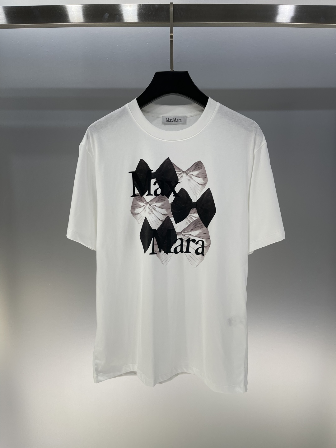 “Exclusive First-Order Quality Butterfly Logo Stamp T-shirt with Artistic Fragrance”