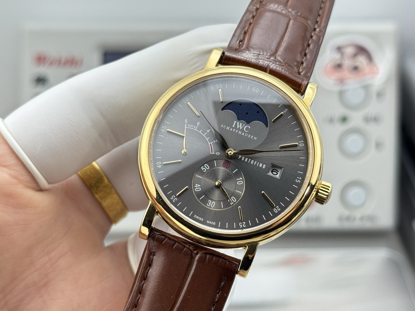 IWC Portofino Hand-Wound Day & Date gold case, brown dial, brown leather strap 45mm Men's Manual-wind