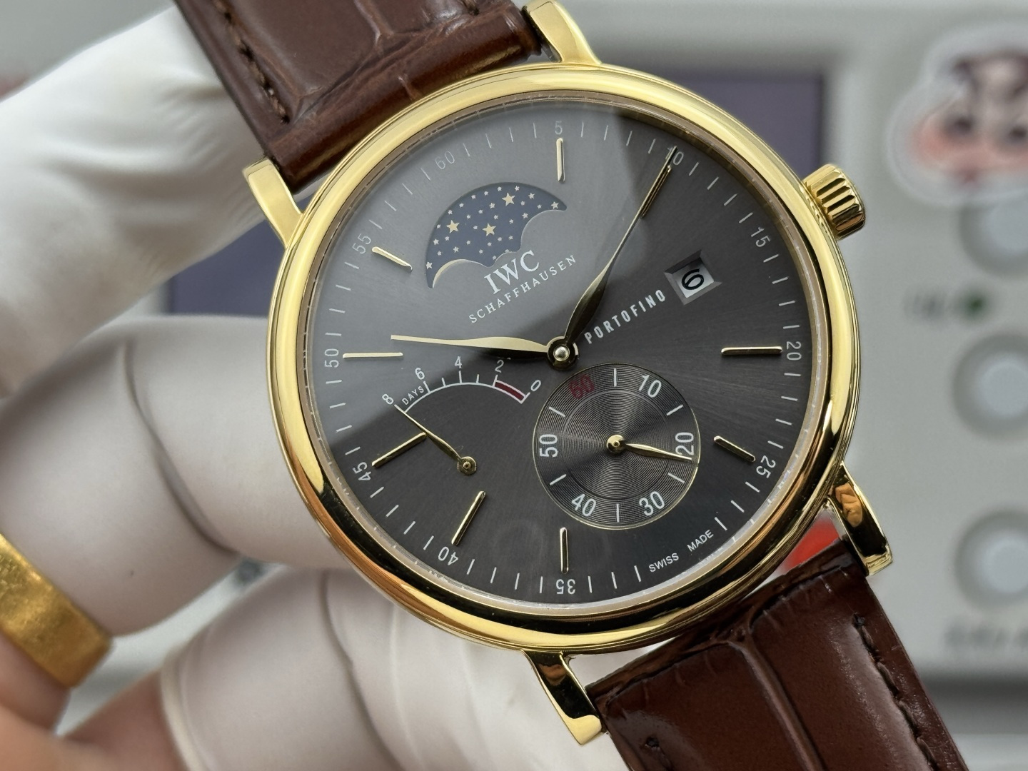 IWC Portofino Hand-Wound Day & Date gold case, brown dial, brown leather strap 45mm Men's Manual-wind
