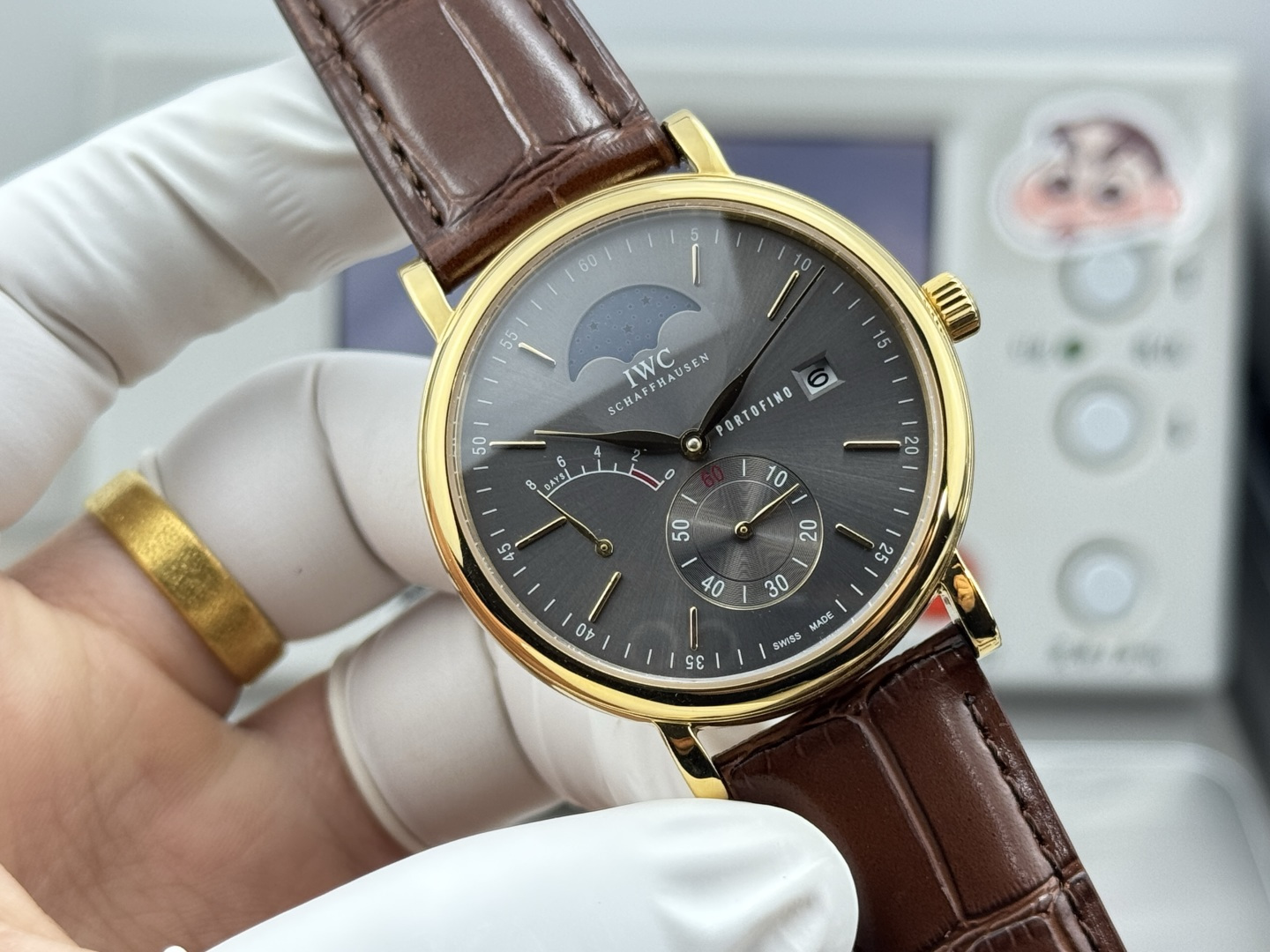 IWC Portofino Hand-Wound Day & Date gold case, brown dial, brown leather strap 45mm Men's Manual-wind