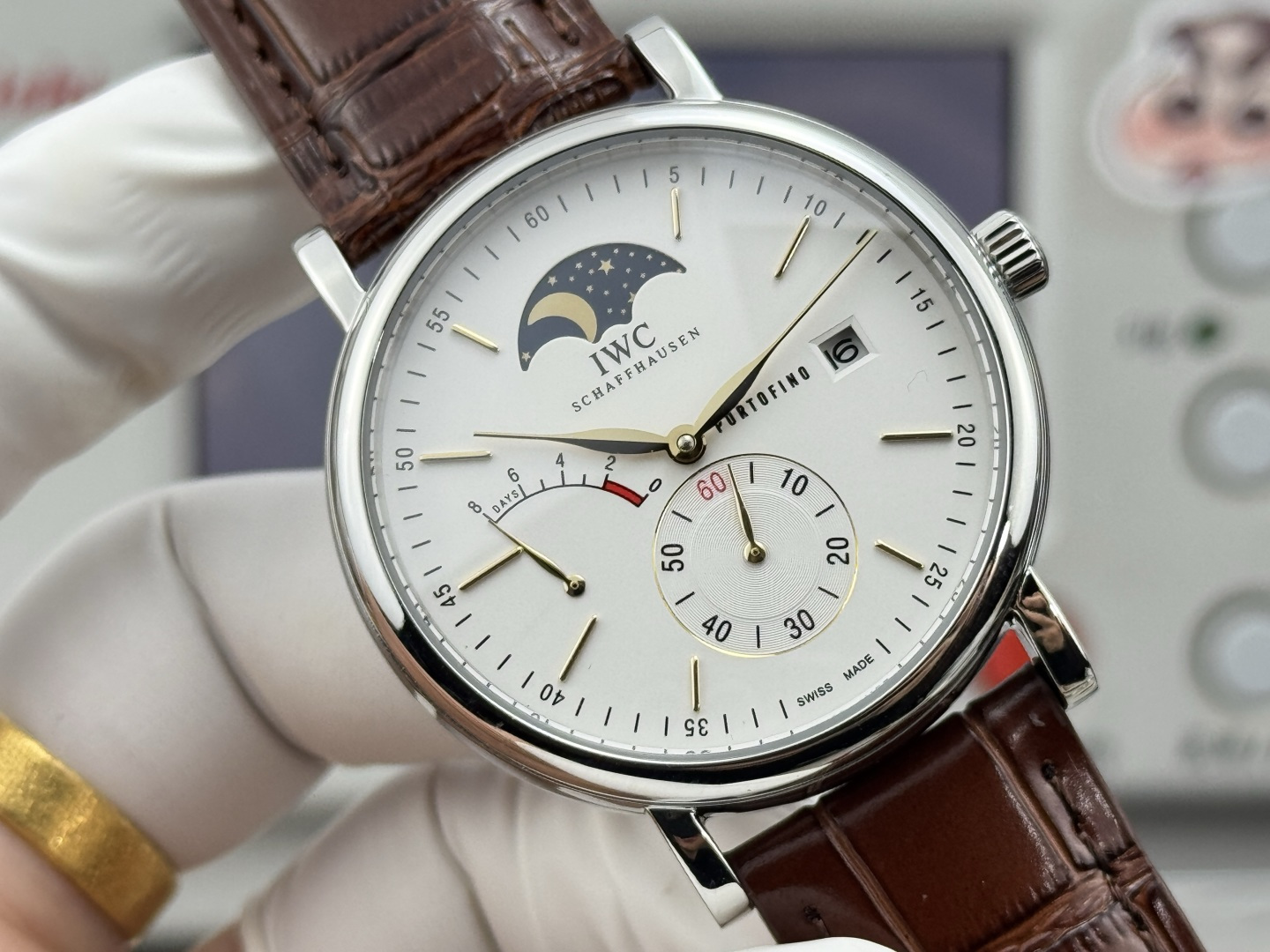 IWC Portofino Hand-Wound Moon Phase Eight Days stainless steel case, white dial, brown alligator leather strap 45mm Men's Mechanical