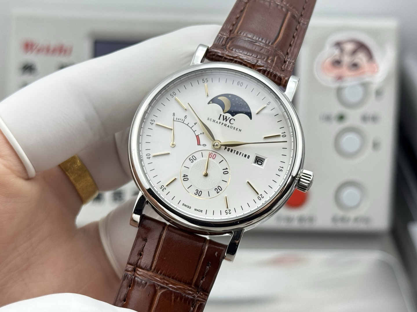 IWC Portofino Hand-Wound Moon Phase Eight Days stainless steel case, white dial, brown alligator leather strap 45mm Men's Mechanical