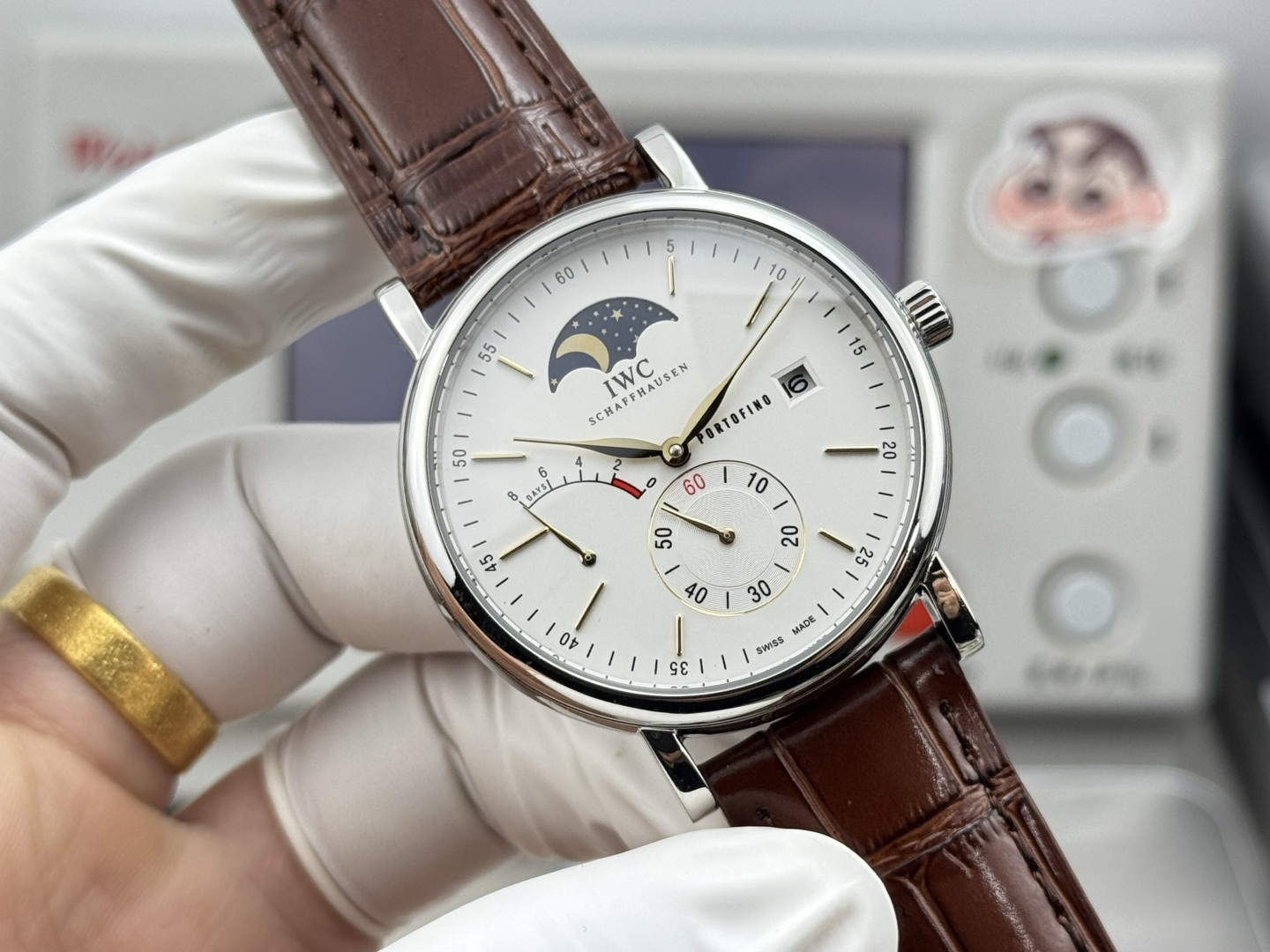 IWC Portofino Hand-Wound Moon Phase Eight Days stainless steel case, white dial, brown alligator leather strap 45mm Men's Mechanical