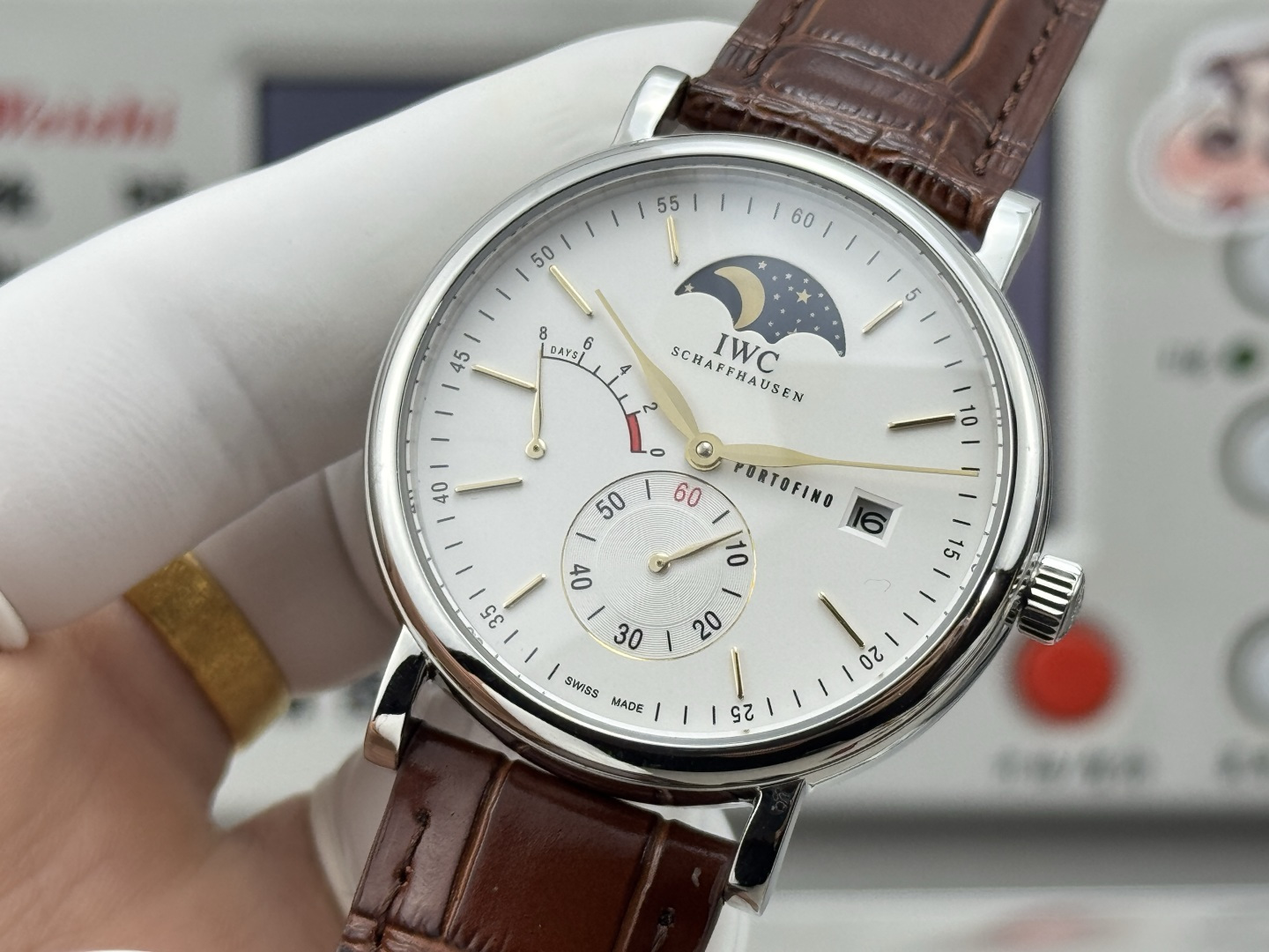 IWC Portofino Hand-Wound Moon Phase Eight Days stainless steel case, white dial, brown alligator leather strap 45mm Men's Mechanical