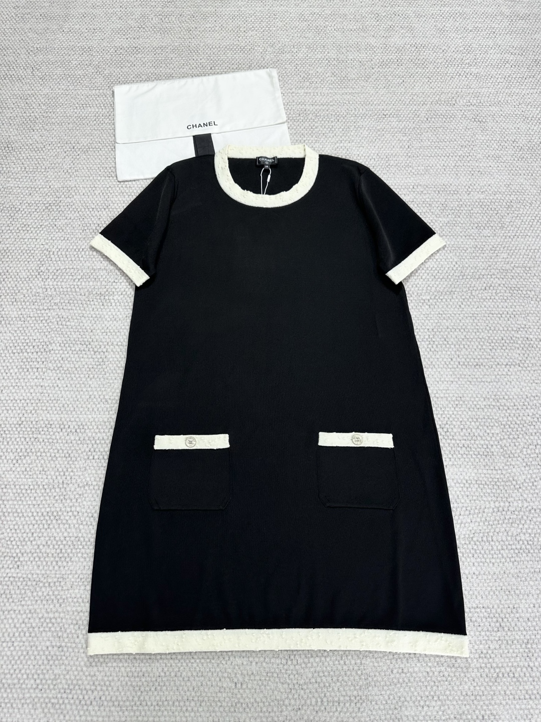 Elegant Chanel-Inspired Black Knit Dress with Contrast Trim and Pocket Details