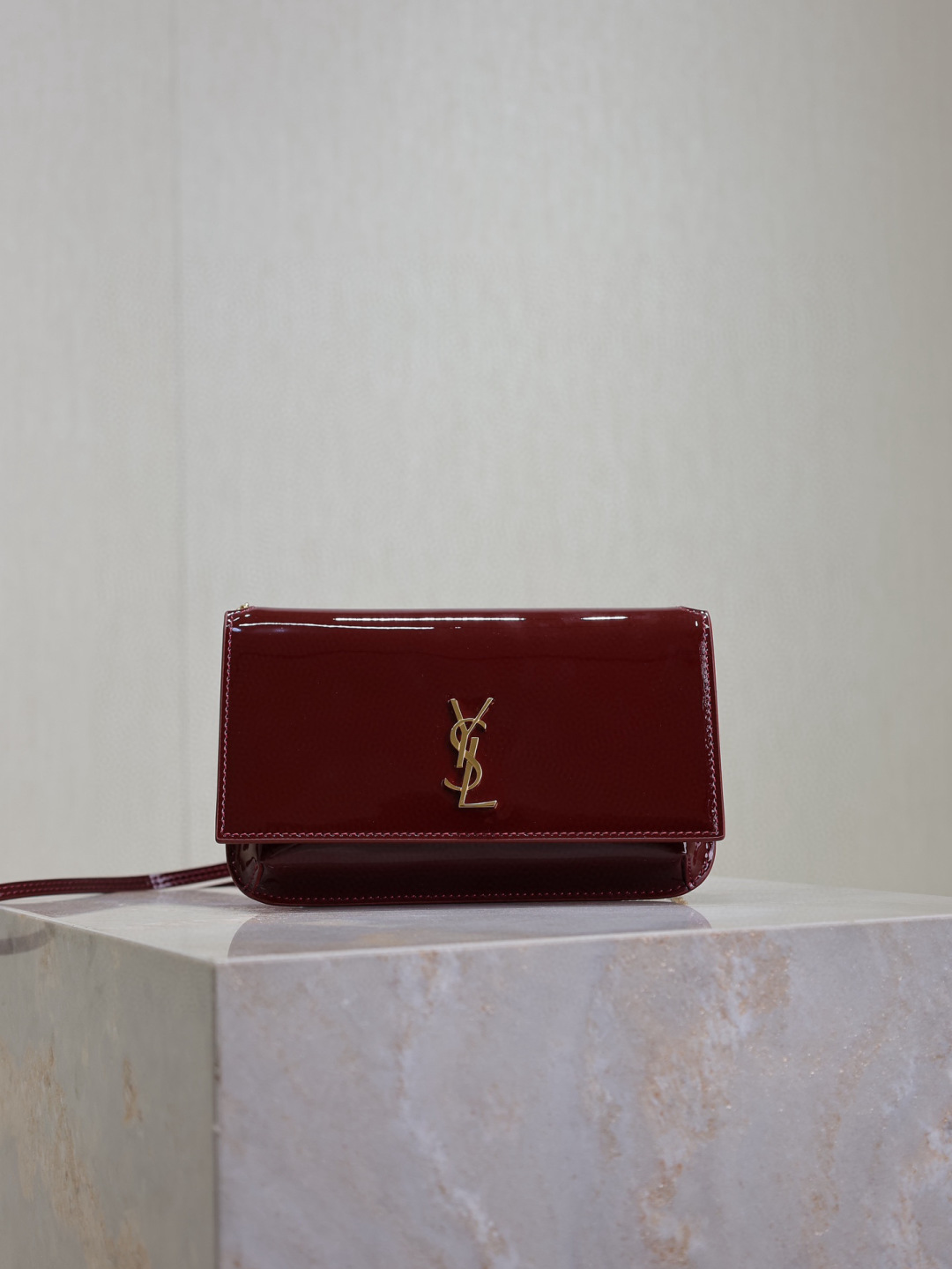 Yves Saint Laurent Monogram Phone Holder Mini Bag in Red Patent Leather