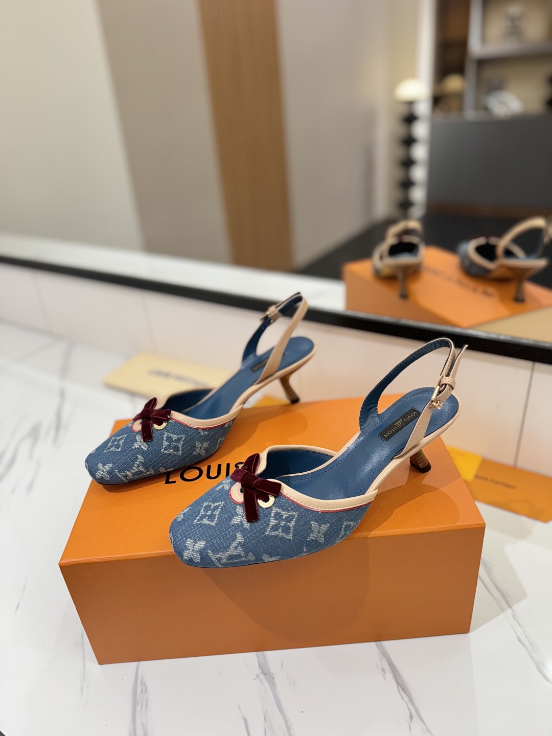 Louis Vuitton Women's Slingback Pumps in Blue Monogram Denim 3 cmp i1739784453469 2956 0 1