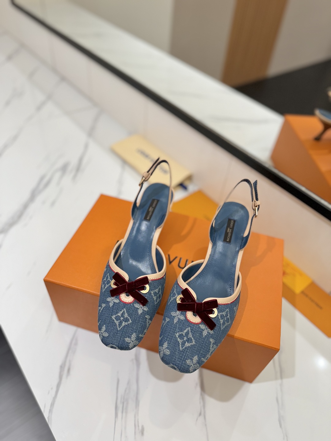 Louis Vuitton Women's Slingback Pumps in Blue Monogram Denim 4 cmp i1739784453469 9789 0 2