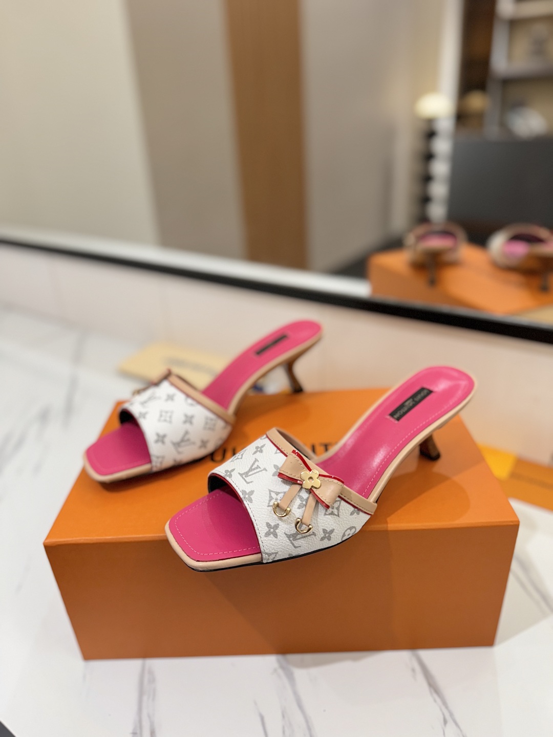 Louis Vuitton Women's White Monogrammed Slides/Sandals with Pink Trim 3 cmp i1739785175015 7410 0 1