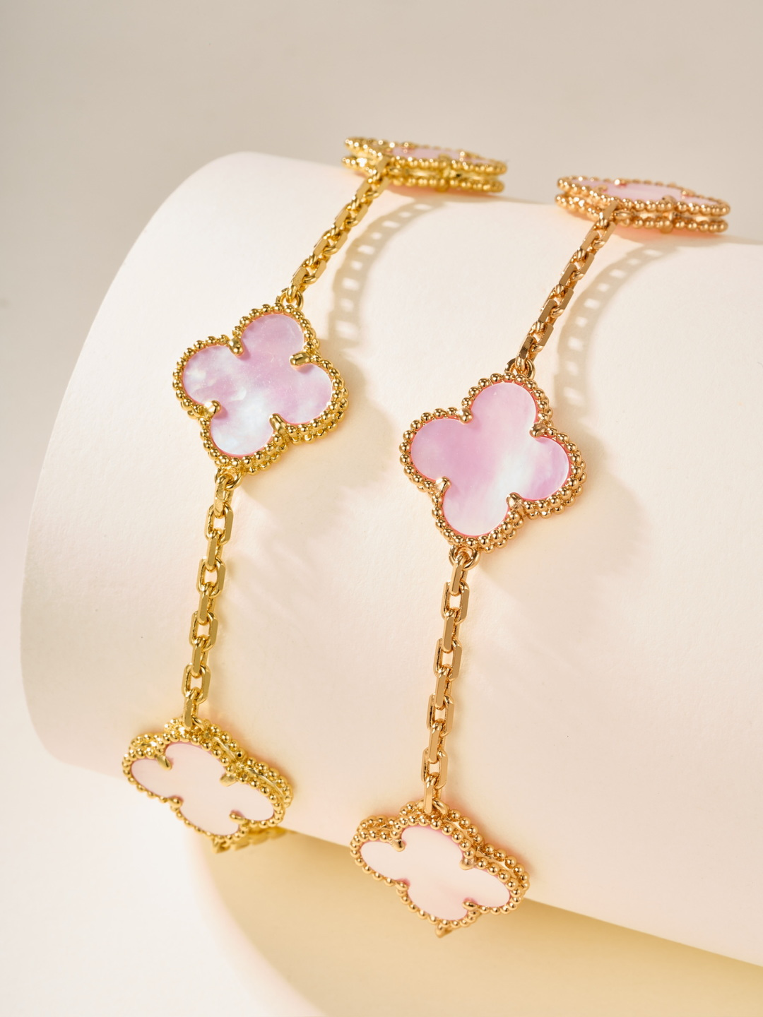 Van Cleef & Arpels bracelet 5 motifs pink mother-of-pearl diamond-shaped clasp