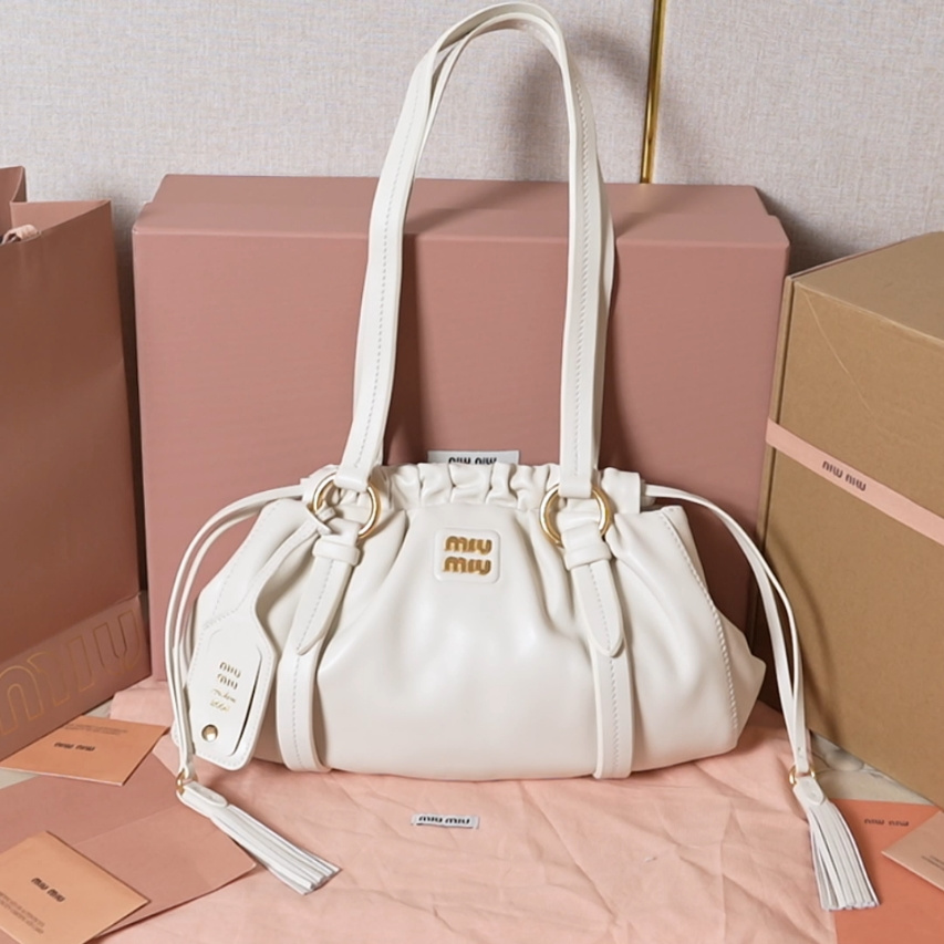 Miu Miu 5BG306 (shipped with an oily edge and a beveled edge)