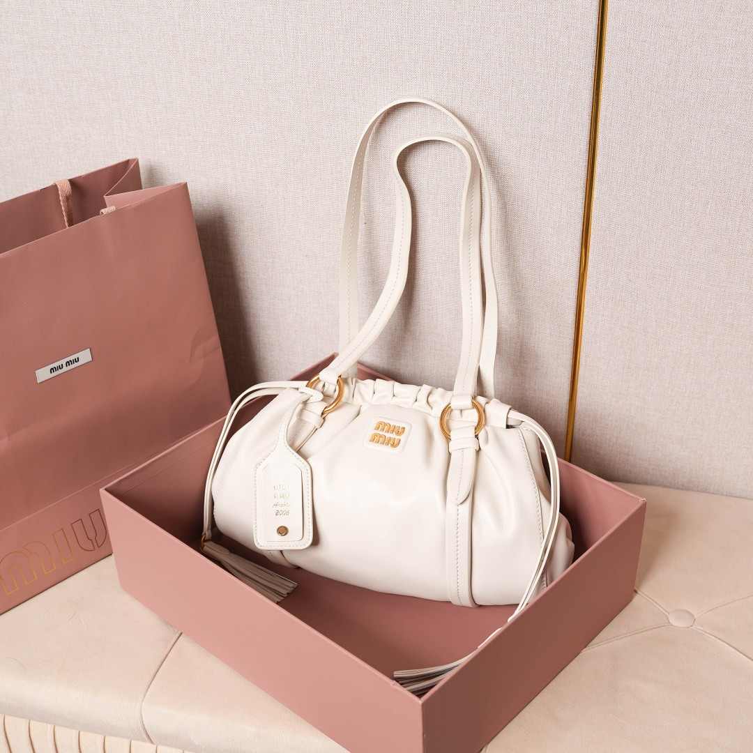 Miu Miu 5BG306 (shipped with an oily edge and a beveled edge)