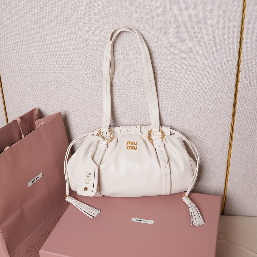 Miu Miu 5BG306 (shipped with an oily edge and a beveled edge)