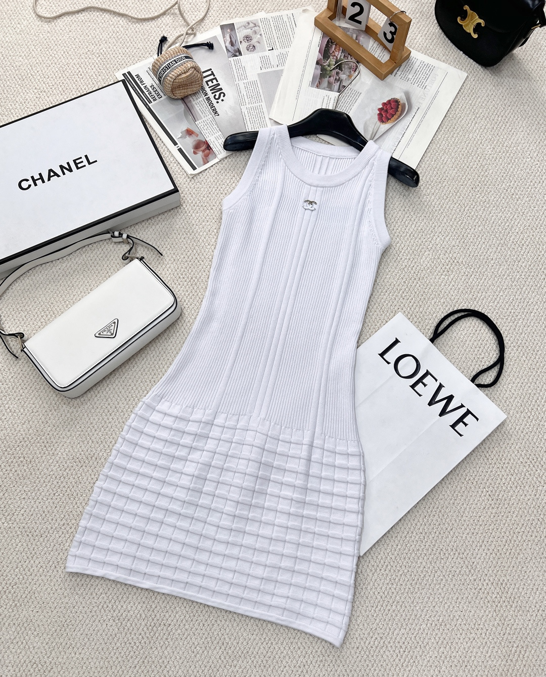 NO:312515,Chanel2025 new three-dimensional pattern knitted vest skirt, customized YB wool yarn wool, comfortable and soft, elastic, U-neck knitted vest skirt cut, neckline cuffs same color threaded edge, ready-made garments use advanced needlework technology, large vertical pit strip skirt hem multi-layer plaid pattern to add literary atmosphere to simple outfits, high-end tailoring fits the human body curve, the gradient metal double C logo on the chest is simple to modify, can easily highlight the high street style, slim fit style, slim and fashionable, all four seasons, single layered, customized surface accessories, accurate version, three standards, large-scale products, size sml code X,,chanel, skirts, alexander wang19860909Chanel2025新款立体花纹针织背心裙,定制YB羊毛纱线织造 舒适软糯 弹力十足 U领针织背心裙裁剪 领口袖口同色系螺纹包边 成衣选用高级走针工艺 大身竖坑条裙摆多层格纹花纹 为简易穿搭增添文艺气息 高级剪裁贴合人体曲线 胸前渐变金属双C徽标简单修饰 就能轻松彰显高街风格 修身版型 显瘦时髦 四季单穿叠穿都 定制面辅料 认准版本三标齐全大货出 尺码sml 编码X,,chanel,skirts,alexander wang,Women's clothing