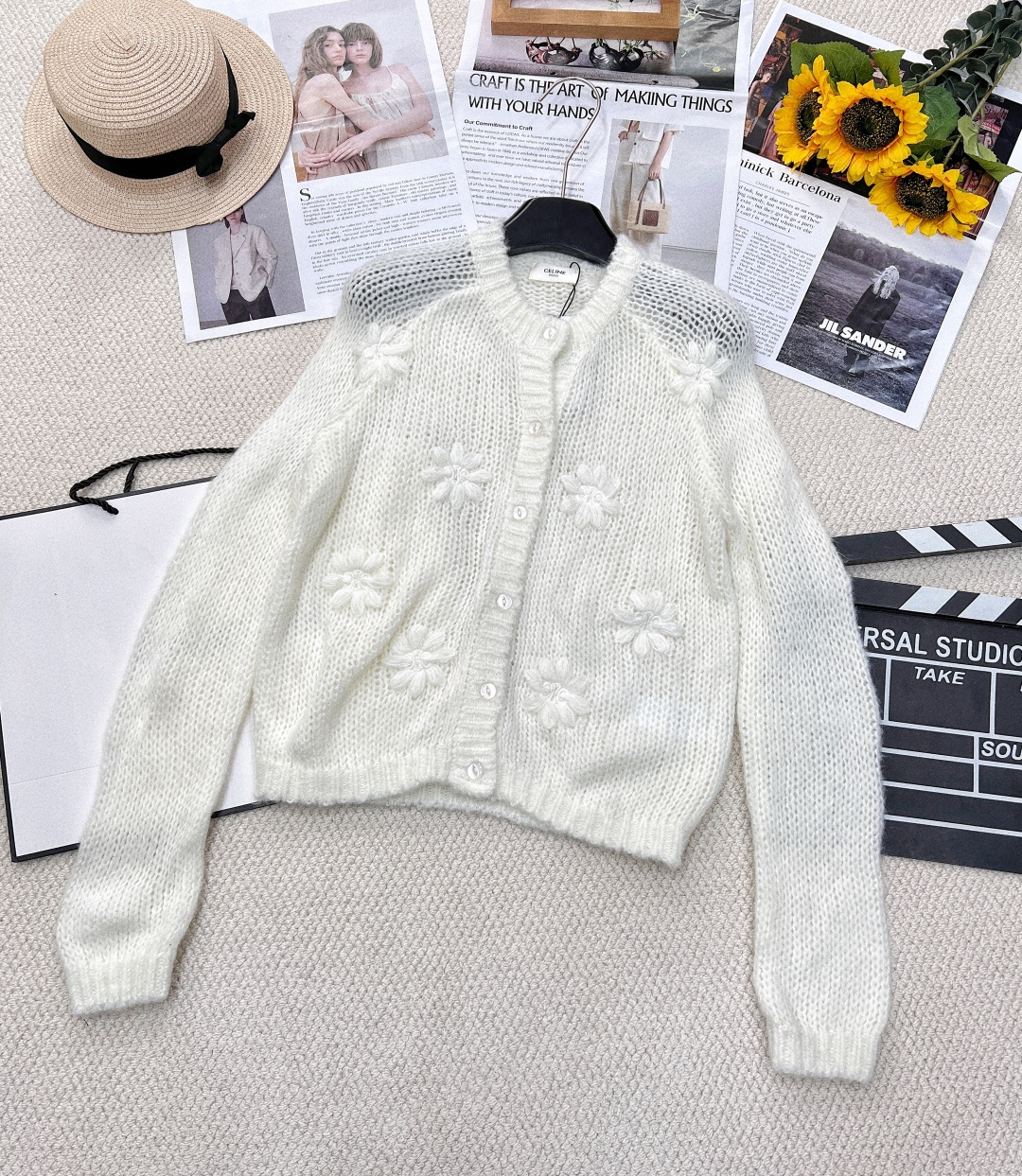 NO:318400,Celine's early spring hand-croche Arc de Triomphe knitted cardigan, the lazy atmosphere is really something other materials cannot do, overflowing the soft and glutinous feeling of the screen, and combining the exquisite atmosphere of the daily life. Overflowing the soft and glutinous feeling of the screen. The fluffy makes the slender body more protective. This is the pure and lustful ceiling~ The shoulder-falling design reflects the lazy and casual style. The upper body is high-end and fashionable. The pure and lustful upper body is the feeling of a good girl!  The rate of return when going out is really high!  The fashionable charm and the atmosphere are full of the flesh and make you look slim!  Complex peach blossom relief   little osmanthus needles. The milky white is really too gentle, warm and age-reducing!  Size sml, celine,alexander wang19860909Celine早春手工钩花凯旋门针织开衫,慵懒的氛围感真是其他材质无法做到的,溢出屏幕的软糯感,复合日常精致分氛围. 溢出屏幕的软糯感.蓬松感让纤细的身型更加惹人保护,这件就是纯欲天花板吧～ 落肩设设计, 很好地体现慵懒随性的风格 上身高级时尚 又纯又欲的上身就是乖乖女的感觉！出门真的回头率超级高！ 时髦的魅力,氛围感拉满遮肉又显瘦！复杂的桃花浮雕 点点桂花针 奶白色真的太温柔了 保暖减龄又时尚！ 尺码sml,,celine,alexander wang,Women's clothing