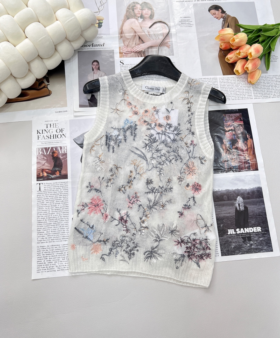 NO:421832,Dior2025 new heavy industry embroidered knitted vest, customized YB imported silk mohair yarn woven soft and comfortable without tying the body Round neck knitted vest cut, light and skin-enhancing, eye-catching and full of points on the upper body, creating a light visual texture, sexy and charming, the whole body is outlined by embroidery craftsmanship, floral insect patterns show the natural forest atmosphere, exquisite workmanship reflects the brand's sense of high-end, regular version, threaded edges add a sense of design layering, relaxed and advanced, easy to layer, suitable for commuting, date and vacation, custom-made surface accessories, complete three standards, large-scale products, size sml code,,dior,alexander wang19860909Dior2025新款重工刺绣针织背心,定制YB进口蚕丝马海毛纱线织造 柔软舒适 不扎身 圆领针织背心剪裁 轻薄养肤 若隐若现上身吸睛满分 打造轻盈视觉质感 性感迷人 通体以刺绣工艺定位勾勒 花叶昆虫图样彰显自然森系气息 做工精致体现品牌高级感 常规版型 螺纹包边增添设计层次感 松弛高级 随意叠穿皆出彩 适配通勤约会度假多穿搭场景 定制面辅料 ,三标齐全,大货出 尺码sml 编码,,dior,alexander wang,Women's clothing