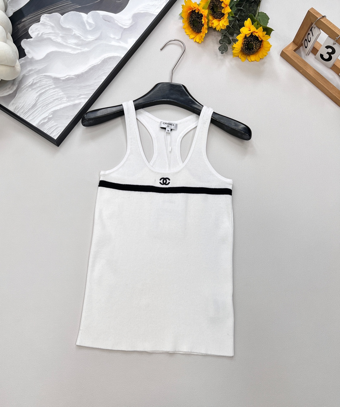 NO:453308,Chanel2025 new C logo embroidery versatile basic knitted vest, customized YB cashmere yarn weaving, comfortable texture, breathable and elastic round neck vest tailoring, I-shaped shoulder straps form round neck, echoing the double C logo on the chest, highlighting the high-end sense of outfit, the texture of the vertical pit strips with threaded edges, light and slimming, showing the slack tone, highlighting the light and luxurious and fashionable temperament, single wear and layering, the first choice for fashionable outfits in all seasons, customized surface accessories, complete three standards, large-scale products, size sml code, chanel, alexander wang19860909Chanel2025新款对C logo刺绣百搭基础针织背心,定制YB羊绒纱线织造 质感舒适 透气弹力 圆领背心剪裁 工字肩带形成圆领 与胸前双C徽标呼应 凸显穿搭高级感 通体竖坑条纹理配有螺纹包边 轻薄修身更显瘦 尽显松弛调性 凸显轻奢时髦气质 单穿叠穿均可 四季时尚穿搭首选 定制面辅料 ,三标齐全,大货出 尺码sml 编码,,chanel,alexander wang,Women's clothing