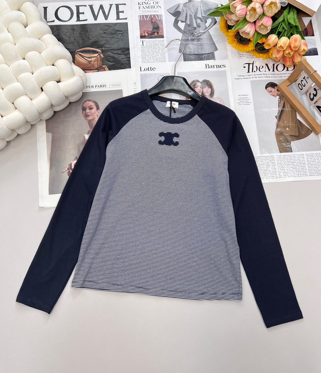 NO:478091,CELINE new base shirt classic long-sleeved base shirt!  It really looks good to whoever wears it!  The temperament highlights are not a little bit, and the exquisite three-dimensional letter embroidery embroidery on the chest. The overall look is very high-end!  It looks good with all kinds of skirts and pants!  You won’t go wrong with comfortable and practical wear and daily commuting!  The blue and white stripes are like wearing the sea breeze on the body. They are very refreshing when worn alone. The skin-friendly and breathable fabric meets three-dimensional tailoring. The blue and white light and shadow under the sun are more charming than the sea breeze. The Triomphe Arc de Triomphe meets the nautical stripes, which has its own vacation atmosphere in South France, lazy and high-end. The three standards are complete, and the large-scale products are size sml coded, celine, skirts, alexander wang19860909CELINE 新款打底衫经典长袖打底衫！真的是谁穿谁好看！气质凸显不是一点半点、胸前精致立体的字母logo刺绣点缀 整体看起来十分高级！搭配各种裙裤都好看的！舒适实穿、日常通勤都不会出错！蓝白条纹像把海风穿在身上,单穿叠穿都很清爽 亲肤透气面料邂逅立体剪裁,阳光下的蓝白光影,是比海风更迷人的存在.  Triomphe凯旋门元素与航海条纹相遇,自带南法度假氛围,慵懒又高级.三标齐全,大货出  尺码sml 编码,,celine,skirts,alexander wang,Women's clothing