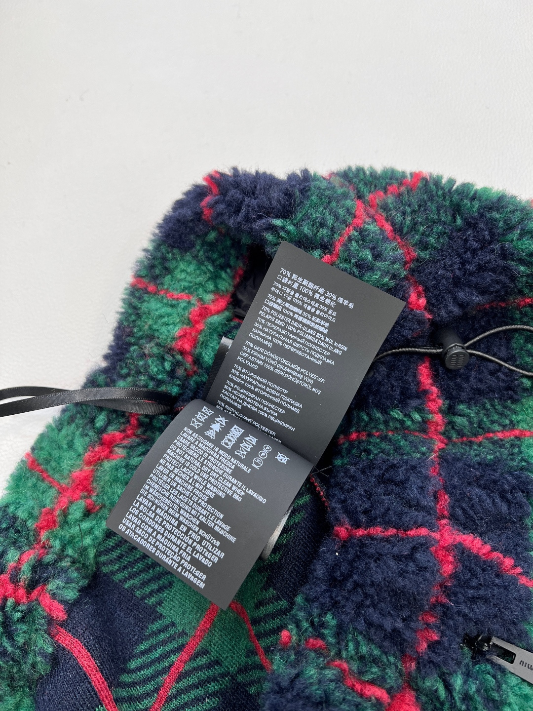 🆕Miumiu2025新款对格对条泰迪毛绒半裙，通体饰以泰迪羊毛绒材质，质感柔软舒适，时髦洋气，松紧腰短