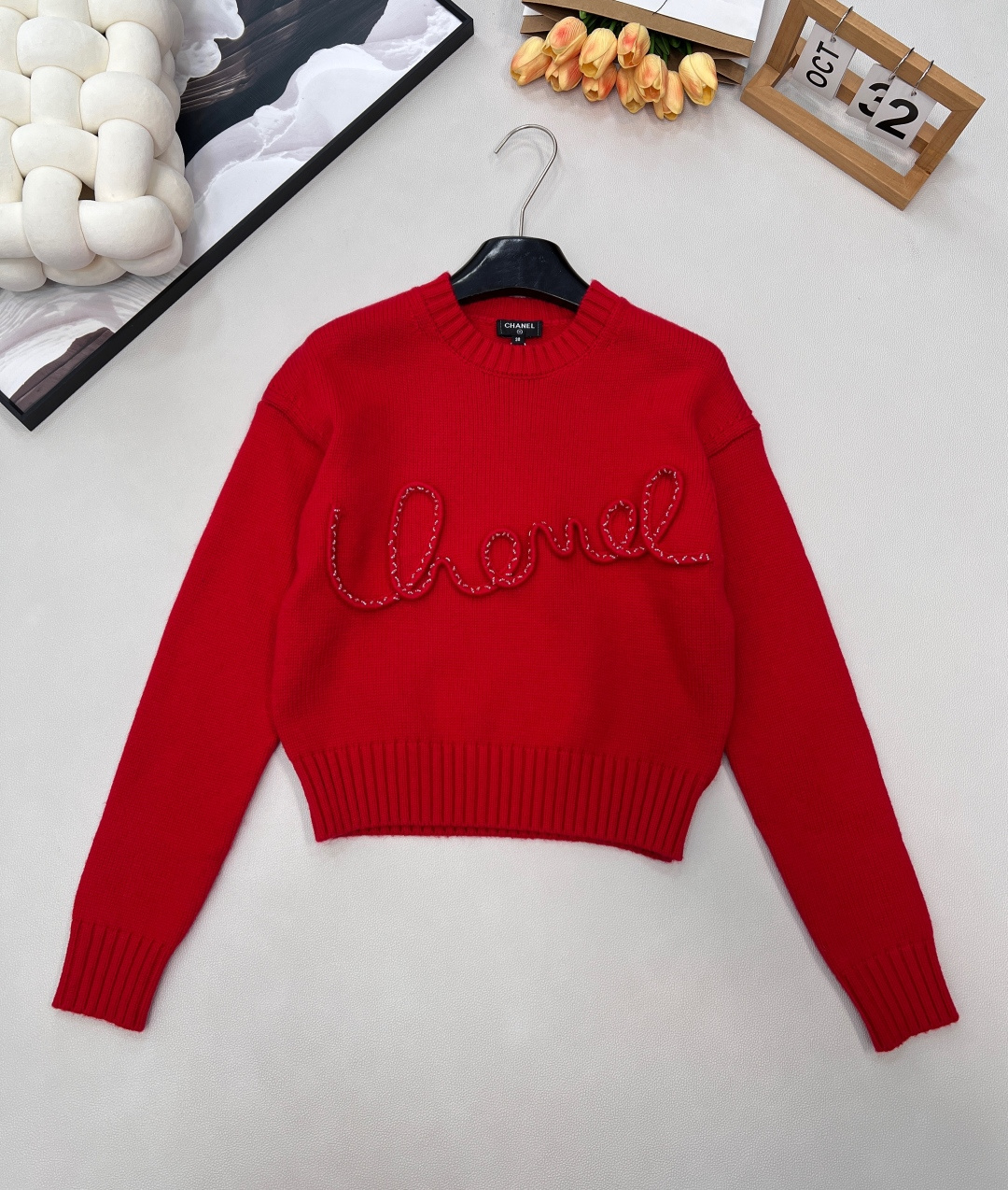 NO:607080,Chanel pink hand-lettered beaded knitted top... I like this one so much. I have been waiting for 1:1 custom-woven and dyed fabric for nearly 39 days. It is definitely the only one in the market. The whole piece is woven on a flat machine imported from Germany. The details and texture are super strong. It looks good with shorts and trousers. The letters on the chest are fully legible... Hurry up when in stock. Size sml code X,, chanel, shorts, alexander wang19860909Chanel 粉色手工字母定珠针织上衣..这件太喜欢了 1:1定织定染等了近39天的面料 绝对是市场独一档的存在整件采用德国进口横机织作 细节质感超强 搭配短裤长裤都好看 胸前字母辨识度满满..现货现货抓紧.. 尺码sml 编码X,,chanel,shorts,alexander wang,Women's clothing