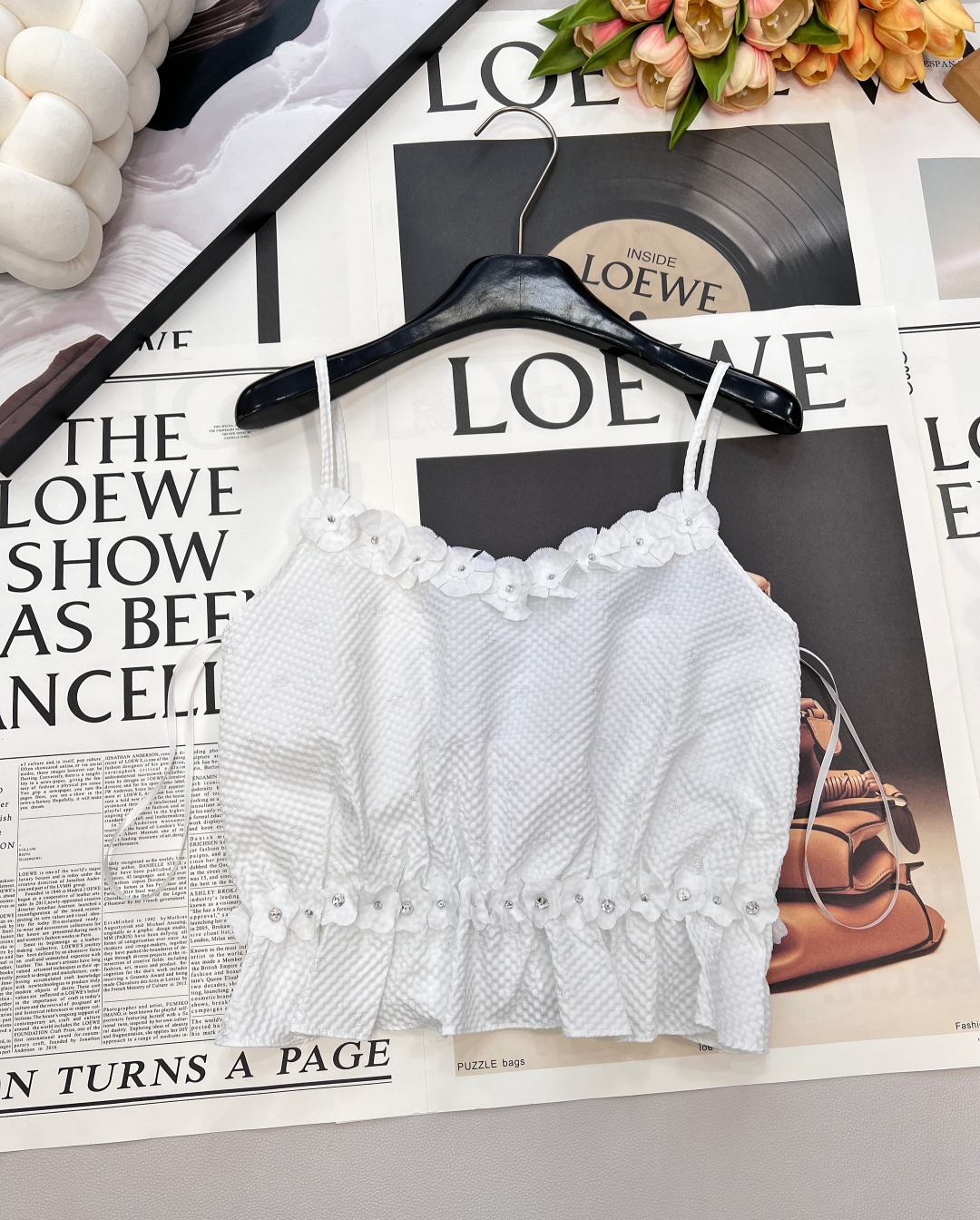 NO:654378,Chanel2025 new camellia spaghetti shoulder sling, customized YB imported cotton silk material, comfortable texture, skin-friendly and breathable, spaghetti shoulder sling, hot and fashionable cutting, concave and convex texture all over, with embellished double C dark pattern, neckline with standing  The camellia edges are outlined with rhinestones on the body, echoing the iconic elements of Xiangjia, enriching the design layers and highlighting the brand style. The small camellia flowers on the waist echo, making the elegant elements more low-key and luxurious, easily contouring the waist, wearing good proportions, and showing a more advanced texture.  , a camisole that is suitable for vacation and can be used in different occasions, playful and stylish. Customized fabrics and accessories, complete with three standards, large quantities, size sml,,chanel,chanel,alexander wang19860909Chanel2025新款山茶花细肩吊带,定制YB进口棉绸材质,质感舒适,亲肤透气,细肩吊带,裁剪热辣时髦,通体凹凸肌理感,搭配点缀的双C暗纹,领口以立体水钻山茶花包边勾勒,呼应香家标志性元素,丰富设计层次,突出品牌格调,腰间小山茶花呼应,让素雅元素更显低调奢华,轻松勾勒腰身,穿出好比例,更显高级质感 ,一款适合度假也可凌驾不同场合吊带背心,俏皮洋气.定制面辅料 ,三标齐全,大货出 尺码sml 编,,chanel,chanel,alexander wang,Women's clothing