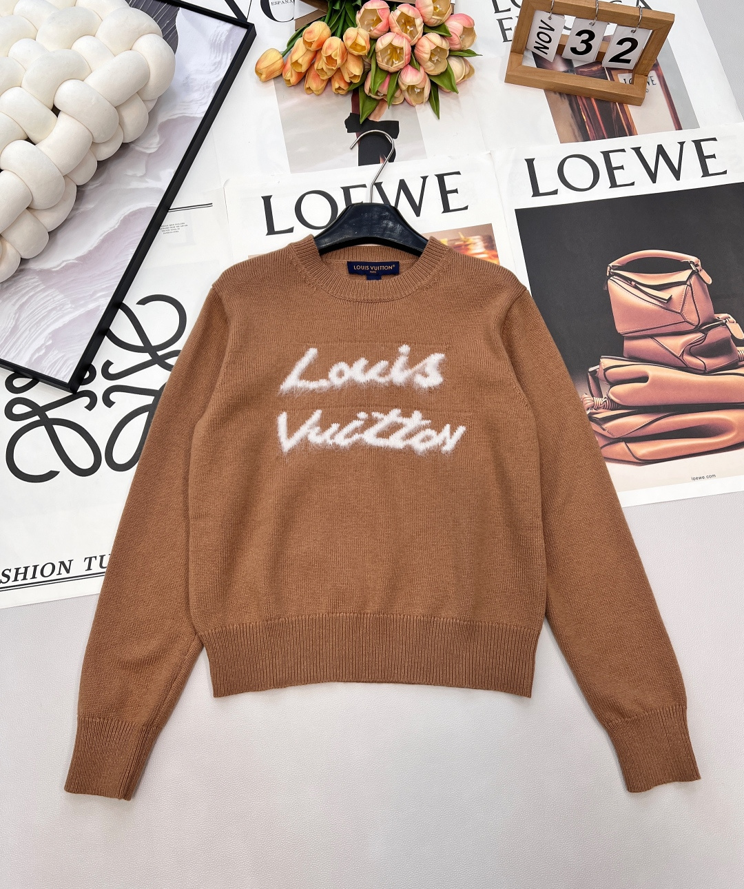 NO:694648,LOUIS VUITTON Chinese New Year limited edition mohair letter sweater sweater is red and very colorful, and the white graffiti letters on the chest are very design. Made of cashmere blended material, soft and warm, super comfortable to wear in autumn and winter! The short slim fit, paired with high-waisted pants and skirts, makes you taller and slimmer, full of festive atmosphere, and very fashionable for daily outings~ Wear it in the New Year and Christmas, it is festive and high-end, and it can easily become the focus of the audience!  Wearing alone as an inner layer can be the finishing touch in the look, combining the personality of luxury brands and the enthusiasm of winter into a unique tone and full of festive atmosphere. Whether it is paired with jeans or a skirt, it looks great and can easily create a New Year shirt or holiday outfit. Red symbolizes happiness and good luck. Wear it in the New Year and the year of your zodiac, which means prosperity and good luck! Three standards are complete, two colors are available. Size sml code,, louis  vuitton,skirts,jeans,sweaters,19860909LOUIS VUITTON 中国新年限定马海毛字母针织衫毛衣正红色超显气色,胸前白色涂鸦字母超有设计感. 羊绒混纺材质,柔软又保暖,秋冬穿超舒服! 短款修身版型,搭高腰裤裙显高显瘦,节日氛围感拉满,日常出街也很时髦～新年,圣诞穿它,喜庆又高级,轻松成为全场焦点! 单穿内搭都能成为造型里的点睛之笔,把奢牌的个性与冬日的热烈揉成独一份的腔调 节日氛围感拉满.无论配牛仔裤还是半裙都很出彩,轻松打造新年战袍或节日穿搭“.红色象征喜庆好运 新年、本命年穿它,寓意红红火火,好运连连！三标齐全,两色出 尺码sml 编码,,louis vuitton,skirts,jeans,sweaters,,Women's clothing