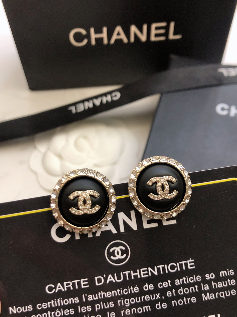 chanel black gold round cc stud earrings