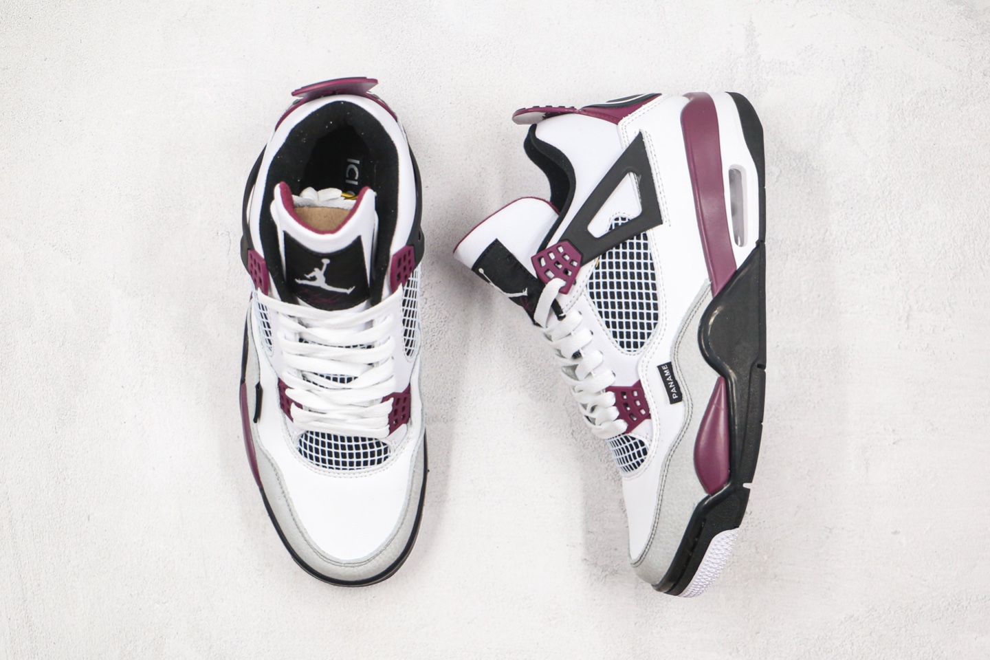 H0  纯原版本 乔丹 AJ4 大巴黎 白紫红色 巴黎圣日尔曼联名 全头层新品Air Jordan 4 与巴黎圣日尔曼联名Jordan Brand 与法国豪门球队巴黎圣日耳曼一直保持着密切合作。今年要迎来一款更具人气的 Air Jordan 4 鞋型。一改此前联名惯用的黑、灰色调。大面积白色覆盖的鞋身，加以黑、紫双色点缀。视觉效果格外清爽，又是一款男女通吃的配色。鞋身多处细节也得以完整曝光。标志性的LOGO「ANAME」被放置外侧。后跟橡胶装饰片改为 Jordan 和大巴黎联名 Logo，鞋提改为黑色横条纹。