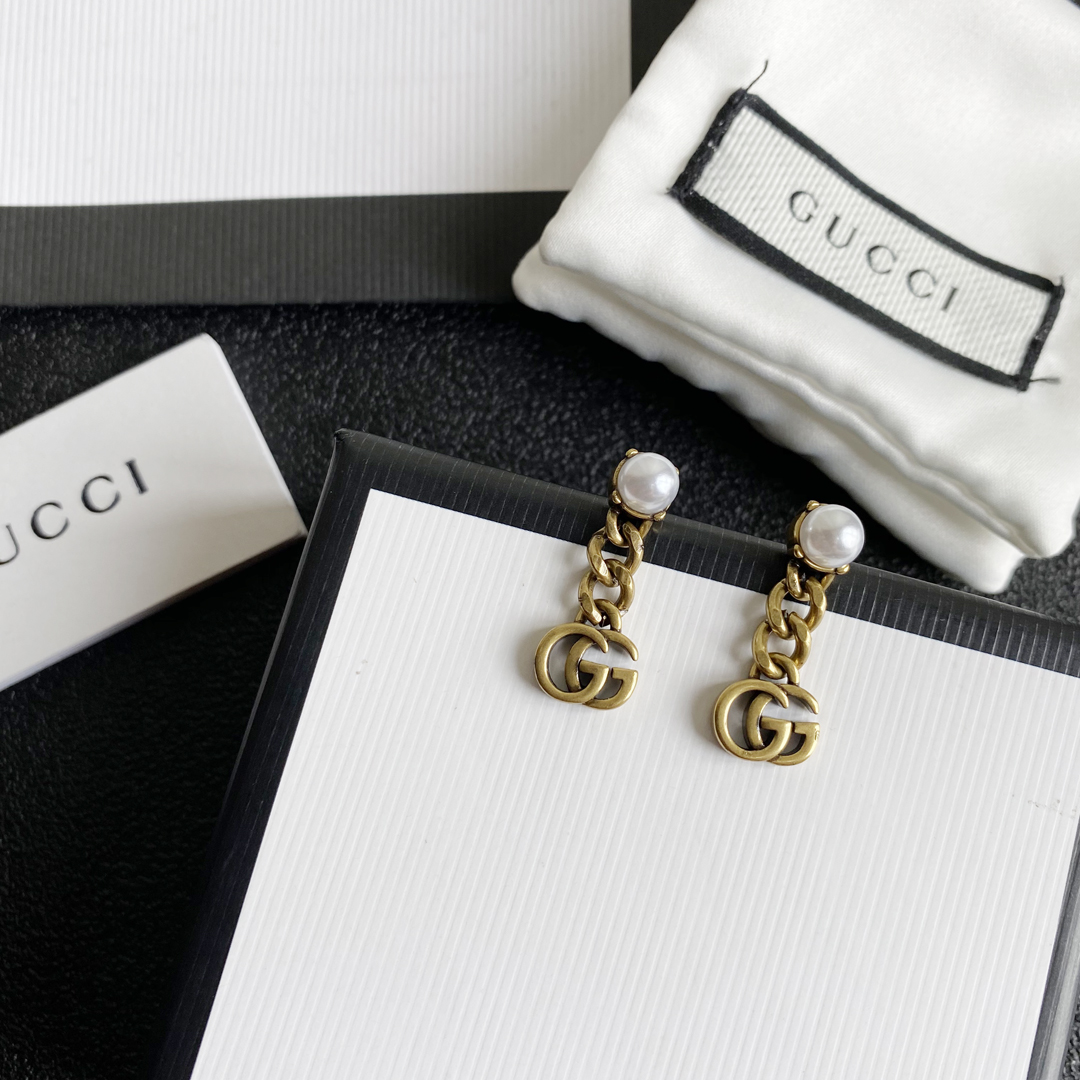 Gucci Jackie 1961 Hobo Inspired Earrings: Pistol & Cylinder Motif 13 o 1fb93uk561dnl1o7emv719o61ko7o
