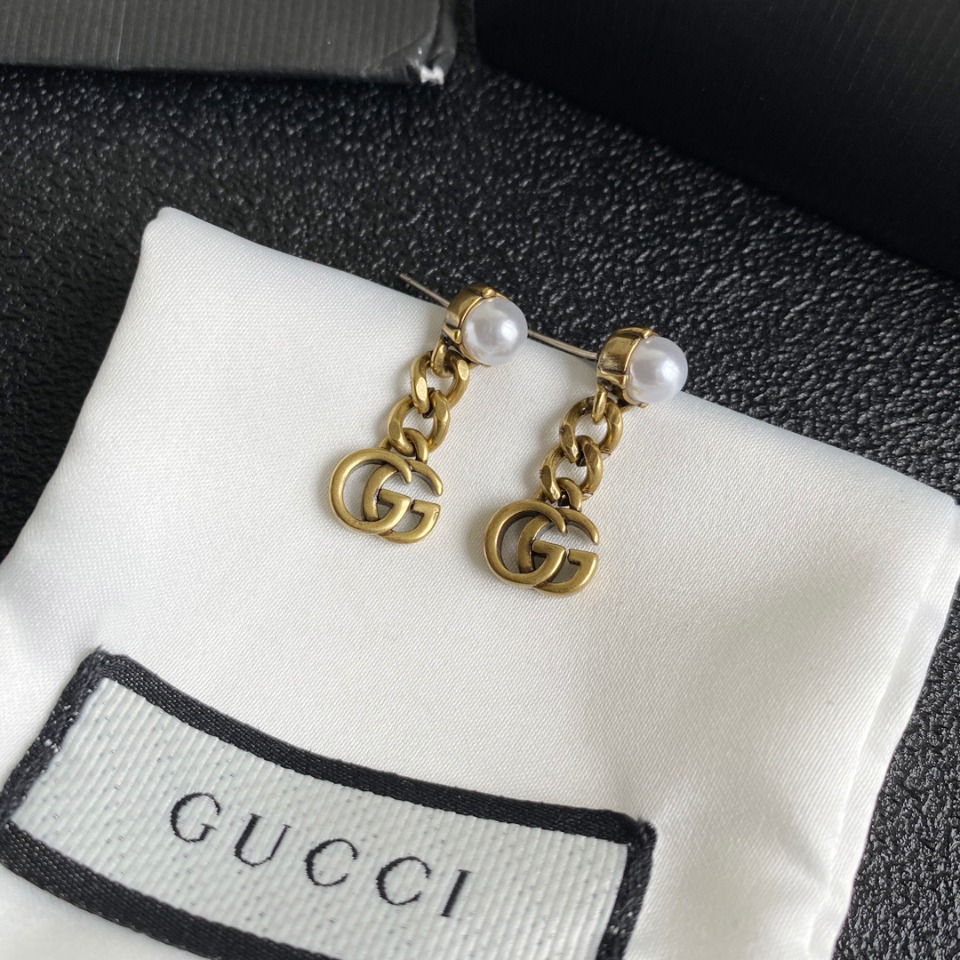 Gucci Jackie 1961 Hobo Inspired Earrings: Pistol & Cylinder Motif 12 o 1fb93uk561l7d1u4j1qh1kmc1o3tr