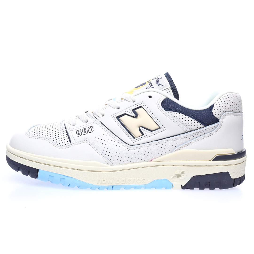 G5 男女鞋真标半码制升级原楦原纸版数据开发版型采用移膜牛培皮组合冲孔皮革鞋面材质厚实耐磨橡胶缓震大底携手NBA经纪人Rich Paul x NB新百伦New Balance BB550系列经典复古低帮休闲运动篮球板鞋“皮革米白海军蓝浅黄”BB550RP1