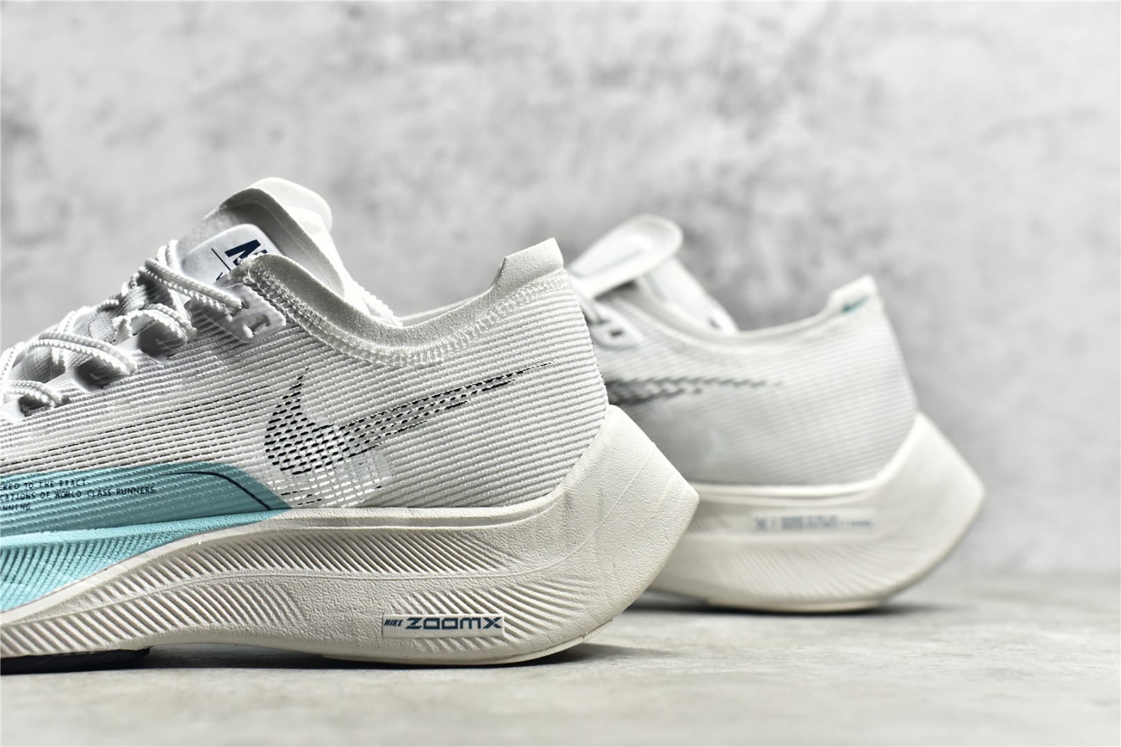 图片[7]-NK ZoomX Vaporfly Next% 马拉松跑步鞋二代 货号：CU4123-101 鞋面使用了全新 Vaporweave 科技，这种类似蝉翼的材质相比 Flyknit 更加轻薄透气，非对称的鞋带系统和泡棉护垫的加入令舒适度更高，采用醒目的绿色作为主色调，鞋头辅以超大的 Swoosh 点缀，再配上流线型外观设计 尺码：36 36.5 37.5 38 38.5 39 40 40.5 41 42 42.5 43 44 44.5 45-选品中心