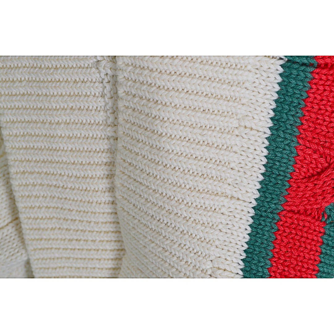 GUCCI/ V-neck cable-knit vest Size: SML This V-neck cable-knit vest has classic red and green webbing details on the hem