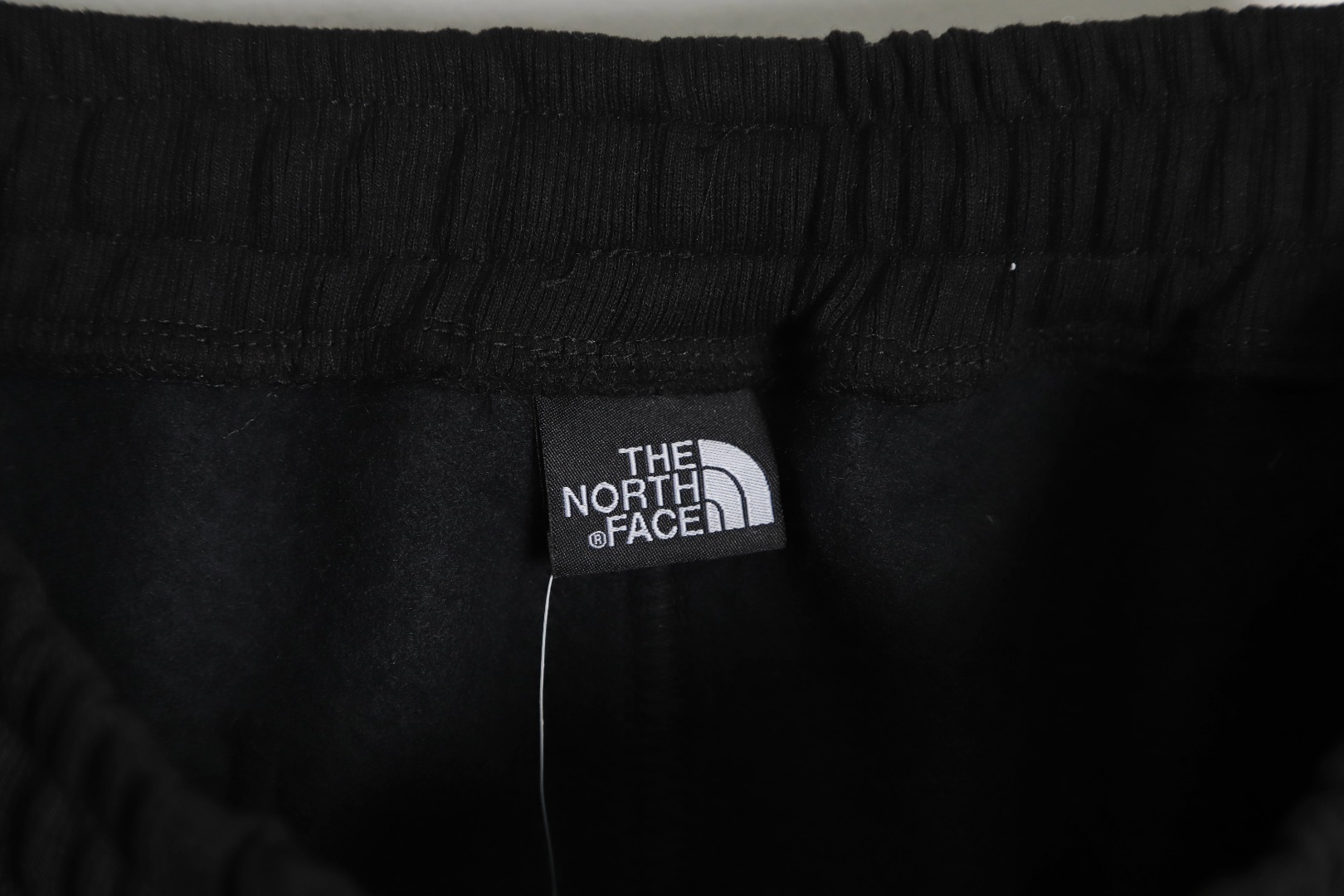 The North Face x KAWS 联名系列 FW22 Logo印花束脚休闲裤